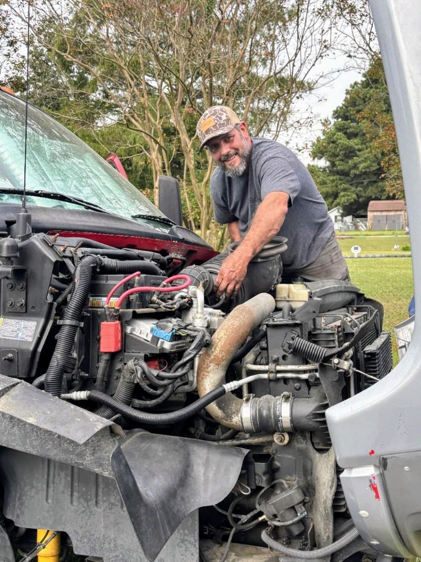Travis, owner of Roadgun Mobile Repair, on-site ready to work